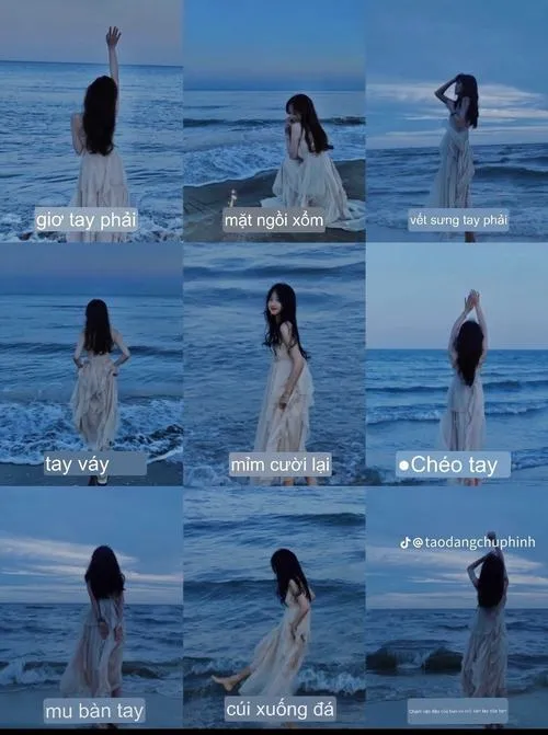 Tạo dáng chụp biển quay lưng đón gió và sóng nước nhẹ.