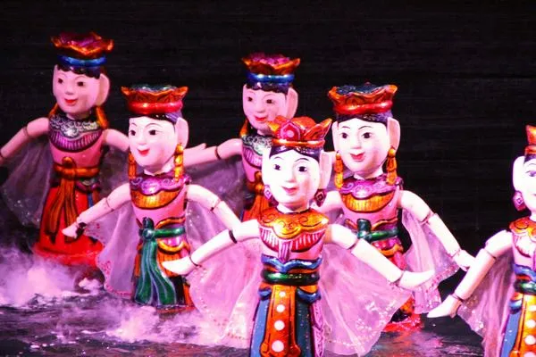 Ảnh chụp múa rối nước lưu giữ giá trị di sản văn hóa truyền thống.