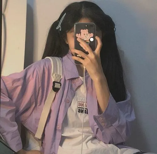 Ảnh gái xinh tóc dài che nửa mặt rất e ấp