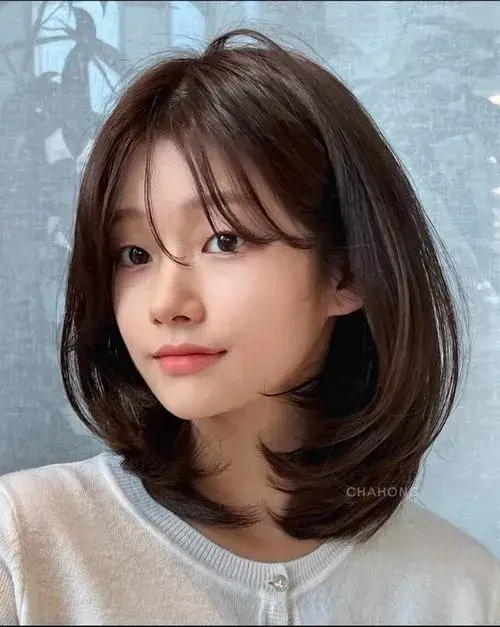 Tóc ngắn tăng độ nổi bật ánh mắt rất dịu mắt