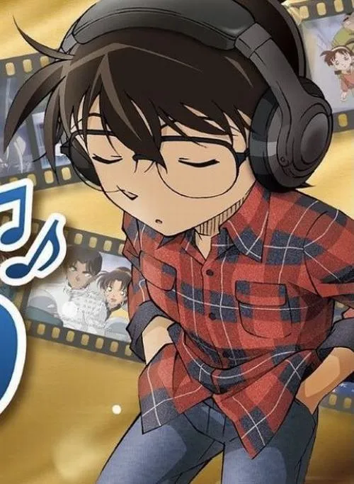 Ảnh Conan đeo tai nghe, áo caro đỏ, nốt nhạc bay quanh tạo vibe chill đáng yêu