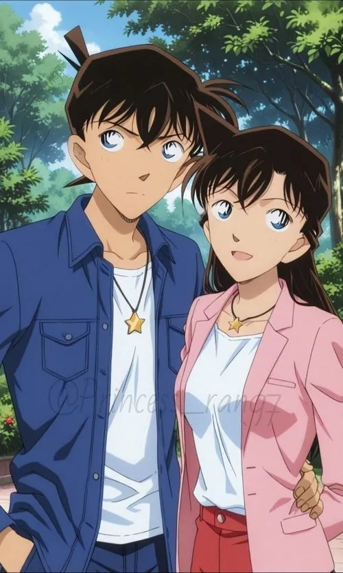 Cặp đôi đứng trước nền sáng, Ran áo hồng, Shinichi áo xanh, vibe đời thường nhẹ và dễ thương
