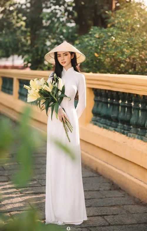 Cách đứng chụp áo dài giúp áo dài cách tân thêm hiện đại