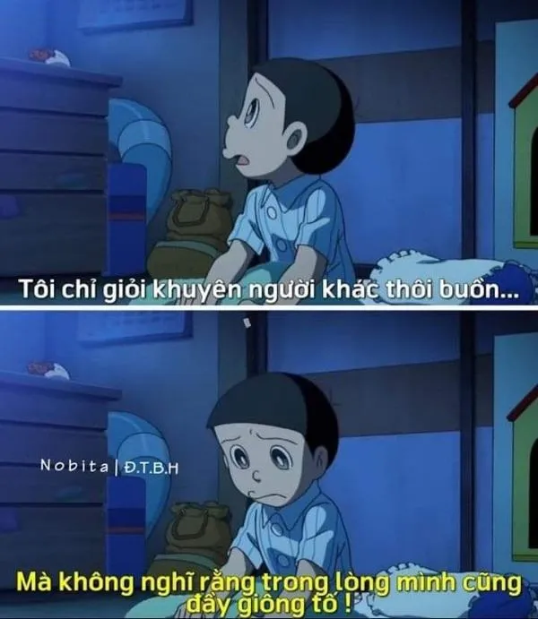 Nobita trong căn phòng tối xanh, nằm im suy nghĩ, nỗi buồn lặng kéo dài không dứt.