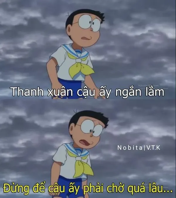 Nobita dưới bầu trời xám, dáng nhỏ thinh, cảm giác tuổi trẻ đi qua mà chẳng ai hiểu.