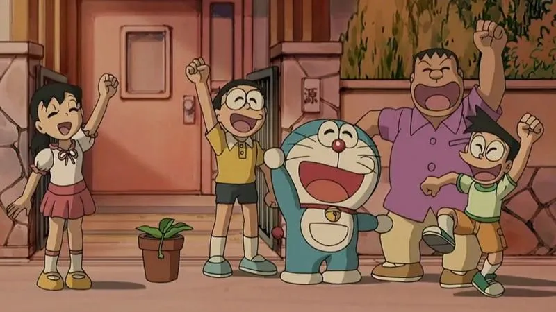 Doraemon cute chibi ôm dorayaki, màu nhấn đỏ vàng rõ, lên màn hình nhìn phát thích ngay