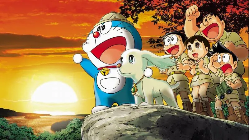 Hình nền anime Doraemon cùng nhóm bạn ngắm hoàng hôn trên vách đá, màu trời cam ngầu nhẹ.