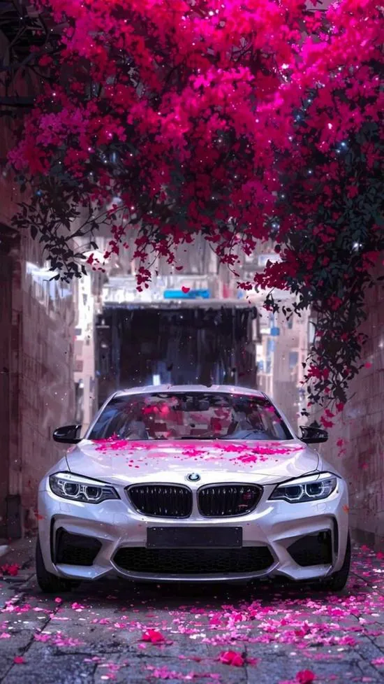 Chiếc sedan trắng đứng chính diện dưới giàn hoa tím rực, tường đá sáng hai bên và lối đi hẹp làm ảnh nền xe hơi chất lượng cao trông gọn và khá cute